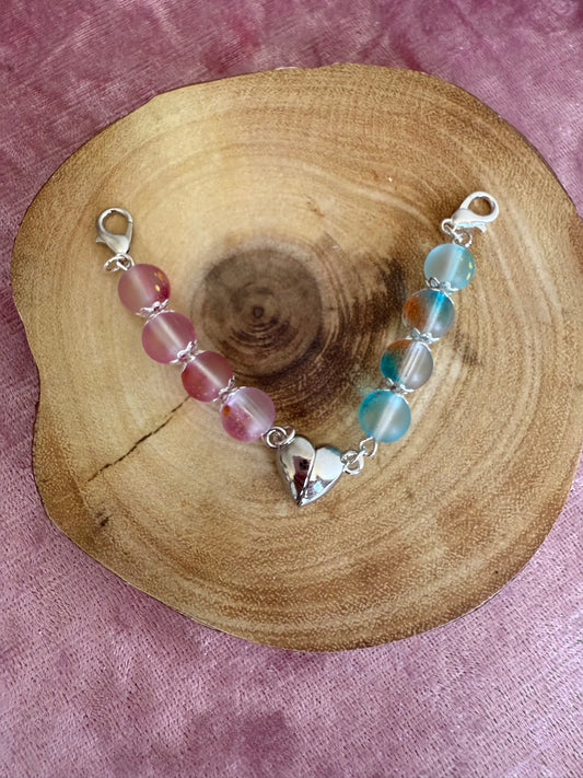 Magnetic dual heart charm