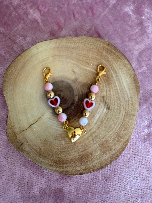 Magnetic dual heart charm