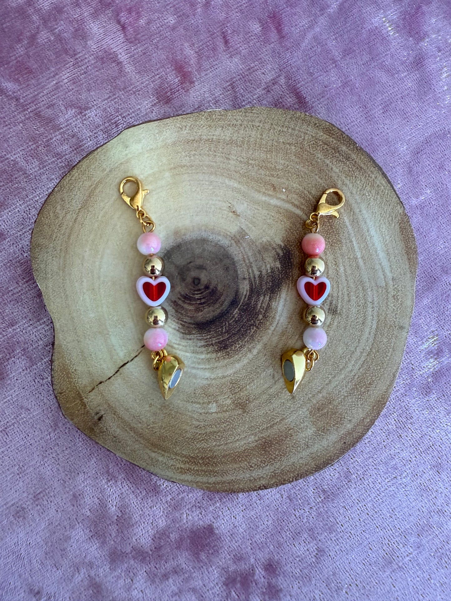 Magnetic dual heart charm