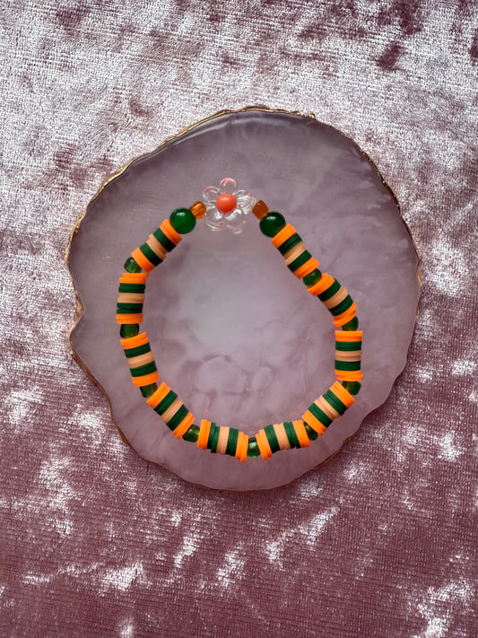 Orange and green clay beaded bracelet