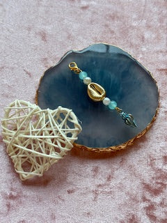 Blue beaded charm with shell
