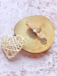 Coral beaded charm with tree of life