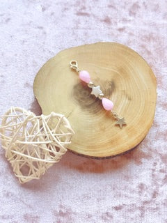 Pink beaded charm with stars